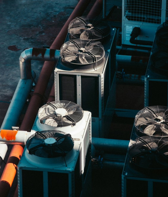 a group of air conditioners sitting next to each other